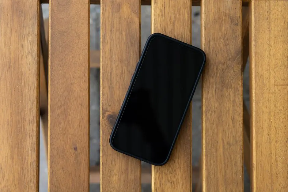 Smartphone modern dengan berbagai fitur teknologi terbaru di atas meja